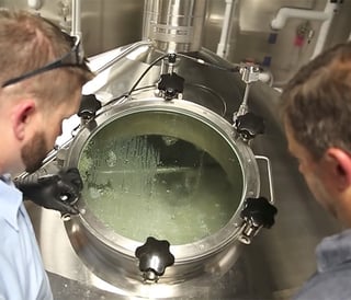 Brewmaster-looking-into-brew-kettle.jpg Quality Brewing Process